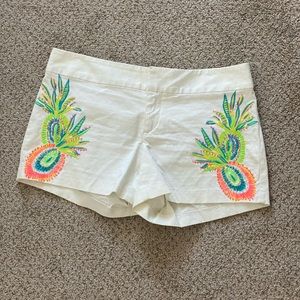 Pineapple embroidered white shorts